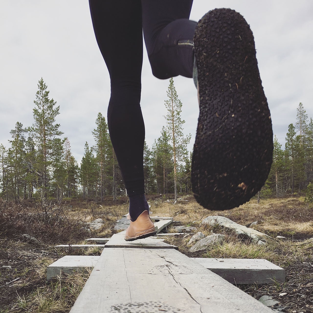 DIY Trail running shoes running in the woods-min